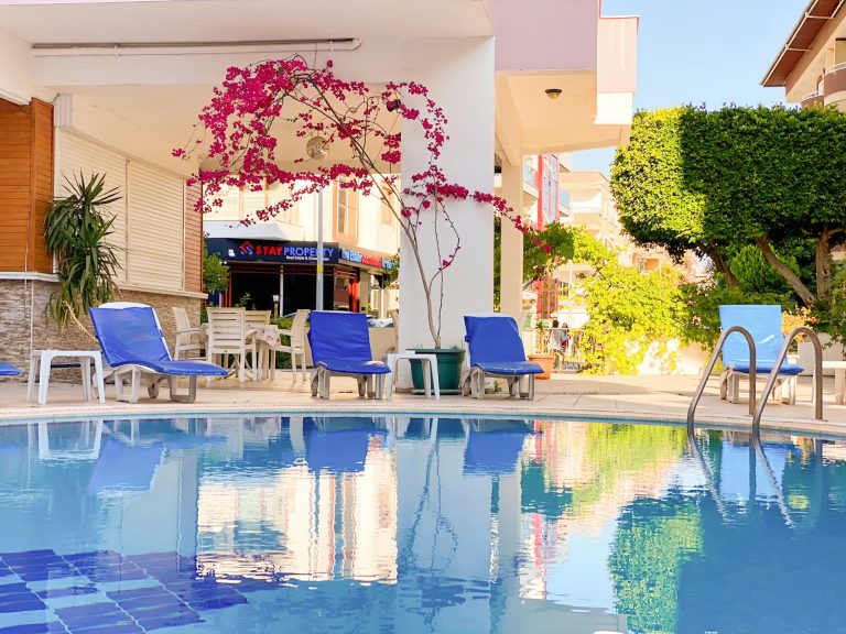 seasonal swimming pool for guests' use, bougainvillea